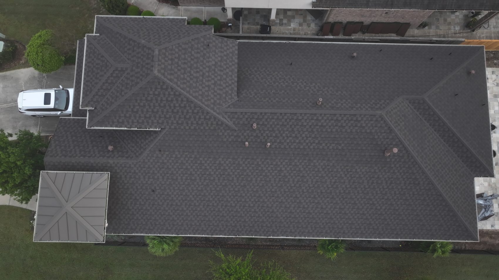 Completed metal roof installation on a home in Richmond, Texas