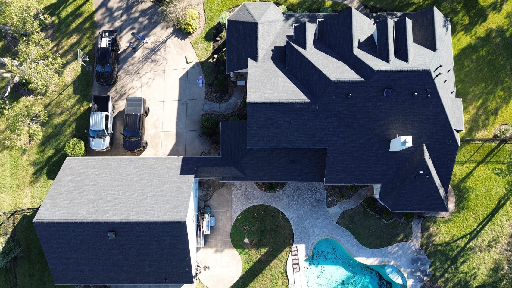 Owens Corning Duration Onyx Black roof with Attic Breeze solar attic fans